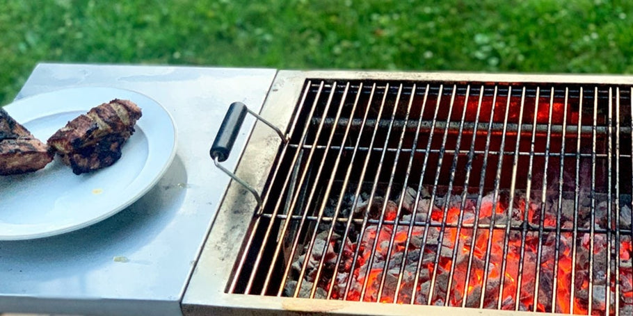 I left this $300 charcoal grill out in the wind, rain, sleet, snow, and salt for a year — here's how it has held up