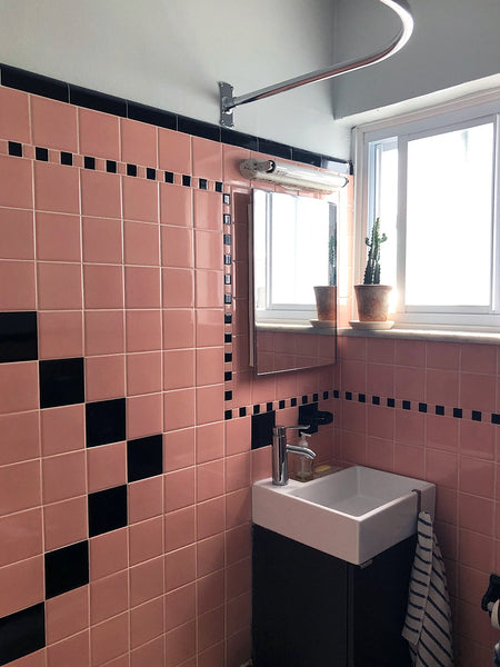 The Layout Tweak That Made This 27-Square-Foot Bathroom Feel Less Mini