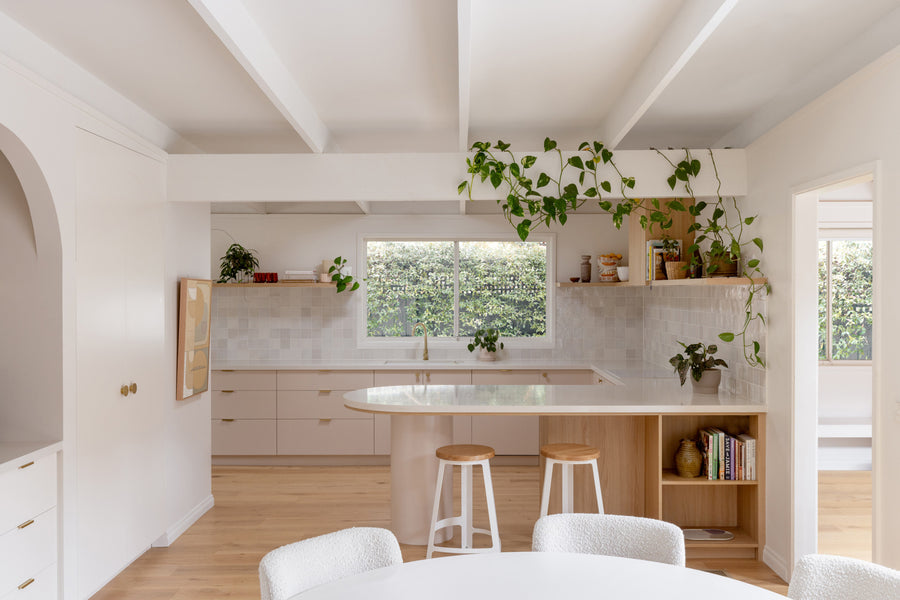 Seventies home given sympathetic nude pink kitchen & laundry reno
